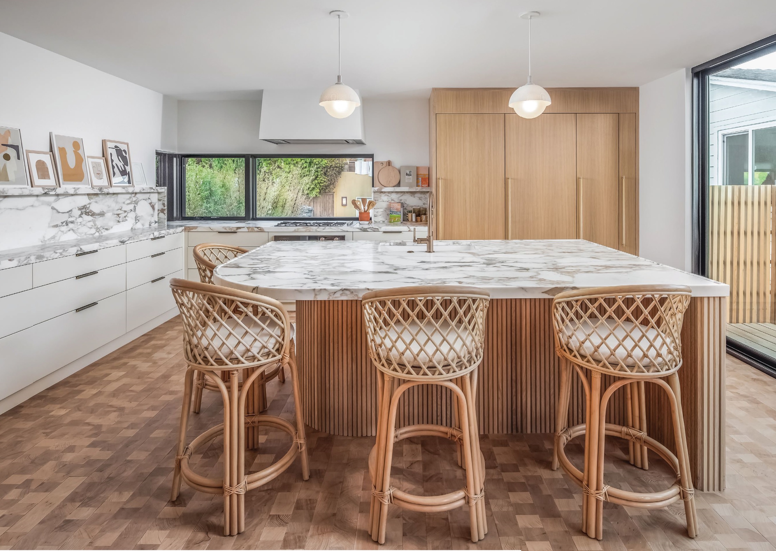 Hemlock flooring and birch cabinetry give the modern kitchen a soft edge. PHOTO BY SAM CHEN/ALOHA PHOTOGRAPHY