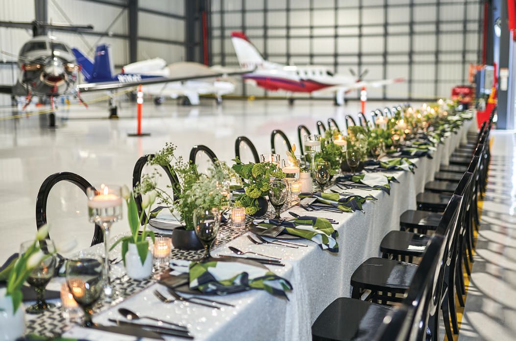 A sleek black and white table design nodded to this dinner’s setting at airport Hangar 858 PHOTO BY HANNAH BERNABE