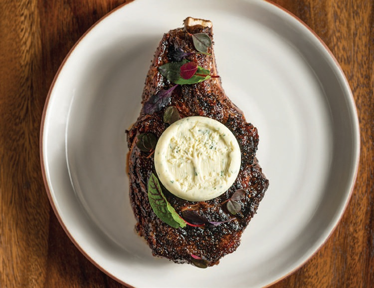 The Flannery Beef ribeye topped with Ember & Rye’s signature embossed buttered blue cheese PHOTO COURTESY OF PARK HYATT AVIARA RESORT, GOLF CLUB & SPA