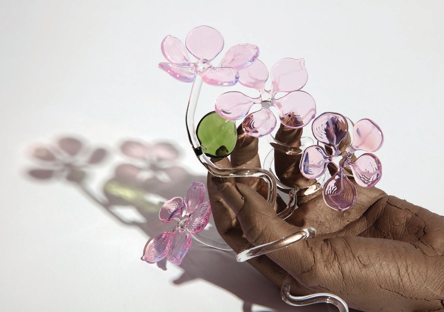 Kelly Akashi, “Cultivator (Hanami)” (2021, flame-worked borosilicate glass, bronze) PHOTO COURTESY OF THE MUSEUM OF CONTEMPORARY ART SAN DIEGO