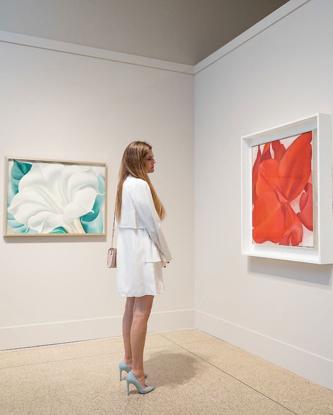 A guest views works in the new O’Keeffe and Moore exhibit at San Diego Museum of Art PHOTO: COURTESY OF SAN DIEGO MUSEUM OF ART