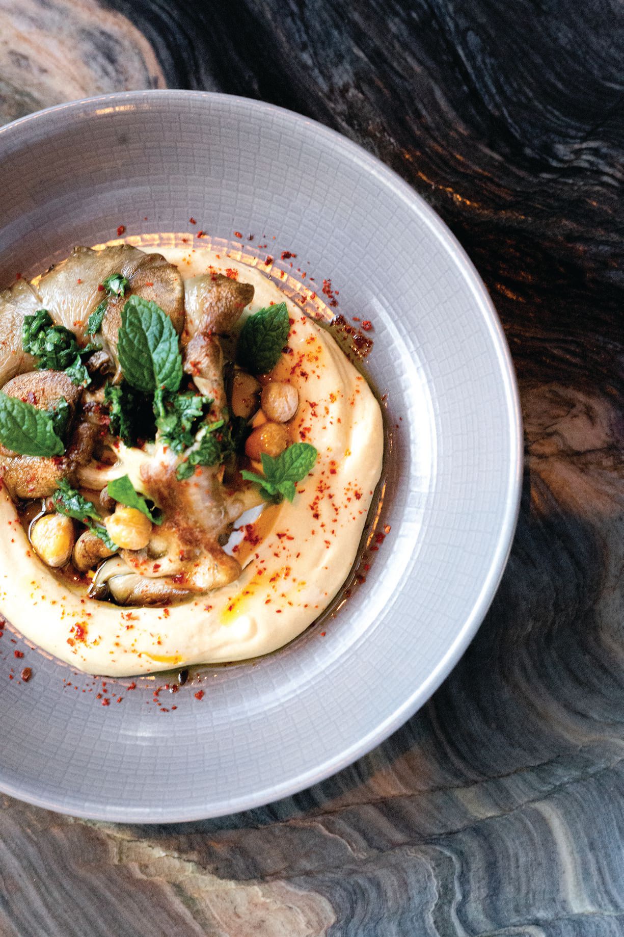 The artful chickpea puree from chef Brian Redzikowski at Little Italy’s Kettner Exchange PHOTO BY JOANN VAN NOY