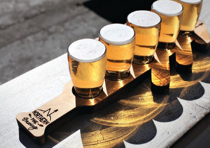 Flights of fresh beer await at Northern Pine Brewing at the Brewers Deck COURTESY OF BRANDS