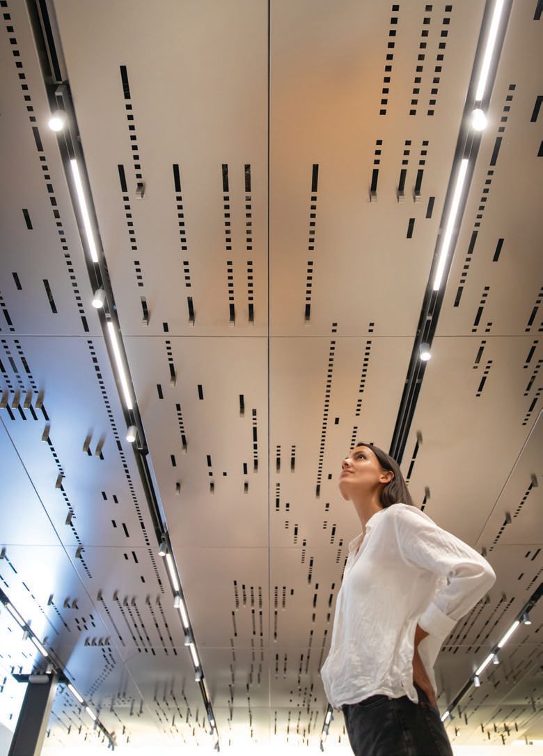 Architect Jennifer Luce worked with artist A. Zahner to create “Suspended Refrain,” a perforated metal ceiling that renders a player piano roll song PHOTO COURTESY OF MINGEI INTERNATIONAL MUSEUM