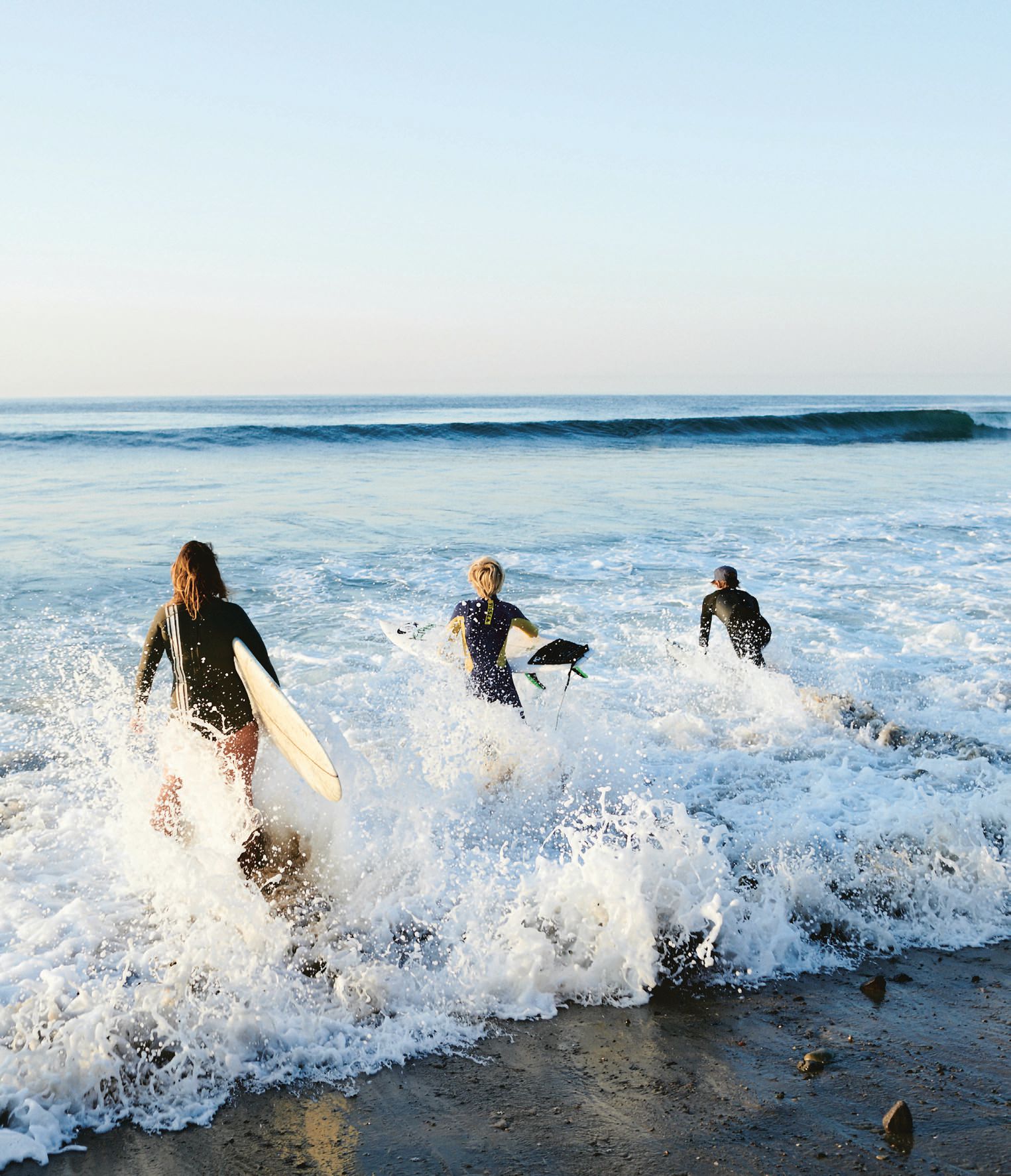 Venice Beach resident Megan Crawford (far left) is one of the female surfers profiled. PHOTO BY ANNE MENKE